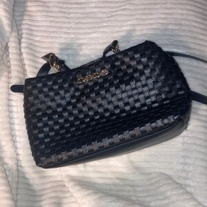 Bebe Elegant Black Woven Handbag